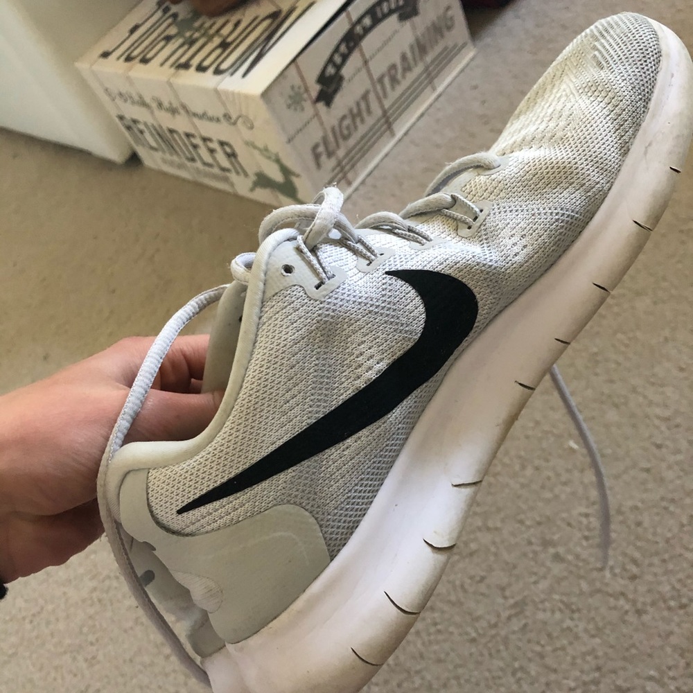 Light grey Nike running shoes